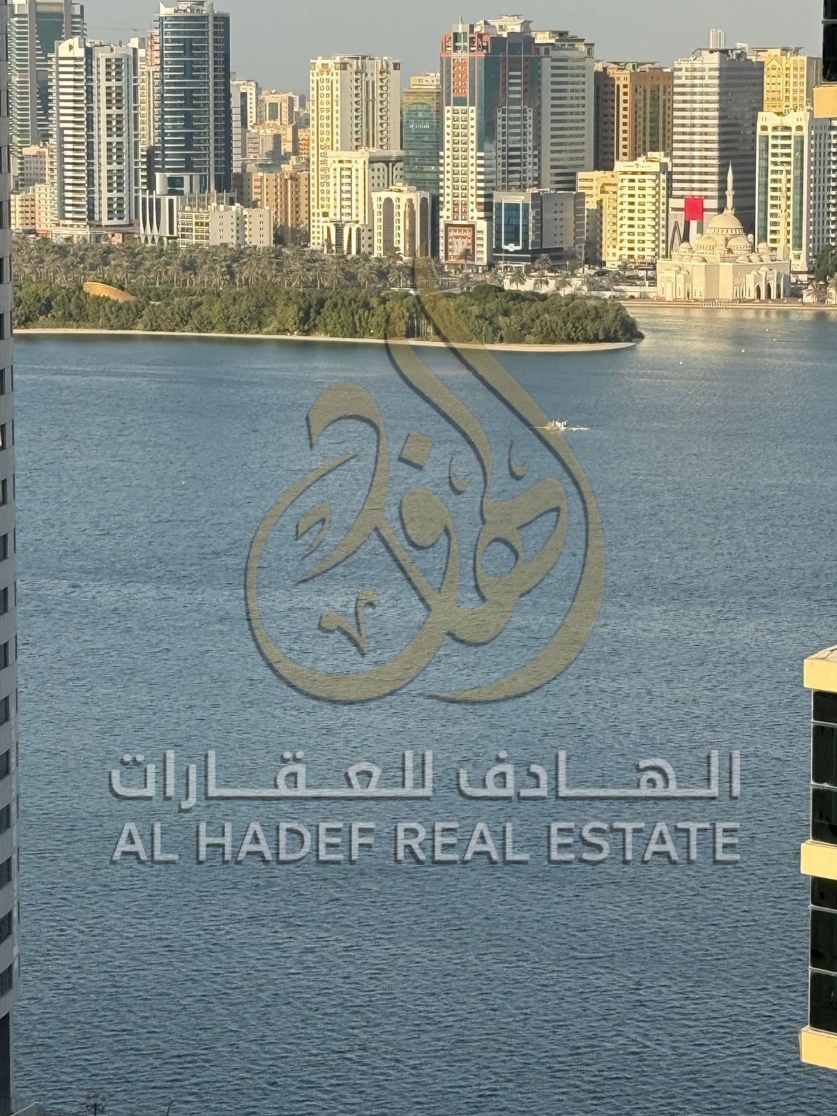 Here's the translation to English: **"A two-bedroom apartment with a living room and a maid’s room for annual rent in Sharjah, Al Qasba area, with a