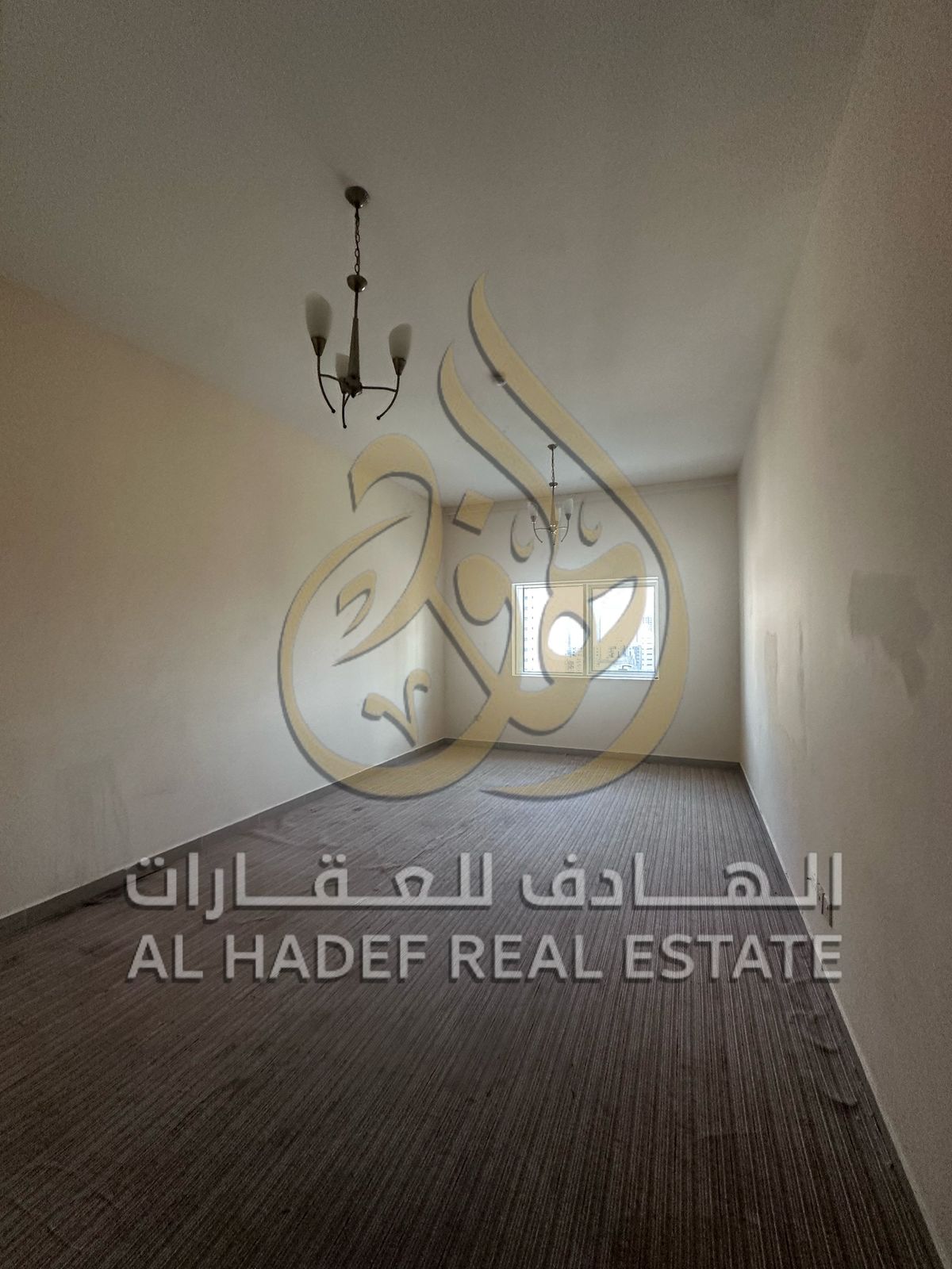 Here is the English translation: **"One-bedroom apartment with a living room for rent in Sharjah, Al Majaz 1 area. AC covered by the landlord, free m