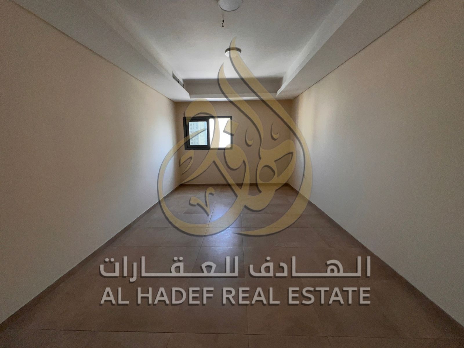 Two-bedroom apartment with living room, parking, gym, and free swimming pool in Sharjah, Al Qasimia area