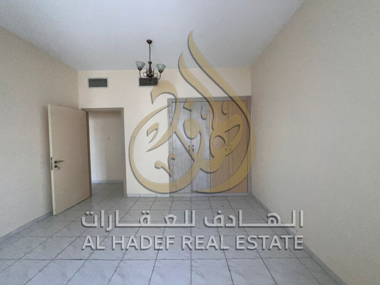 3 bedrooms and a living room with a dressing room, laundry room, and balcony in one of the best locations within the Al Taawun area.