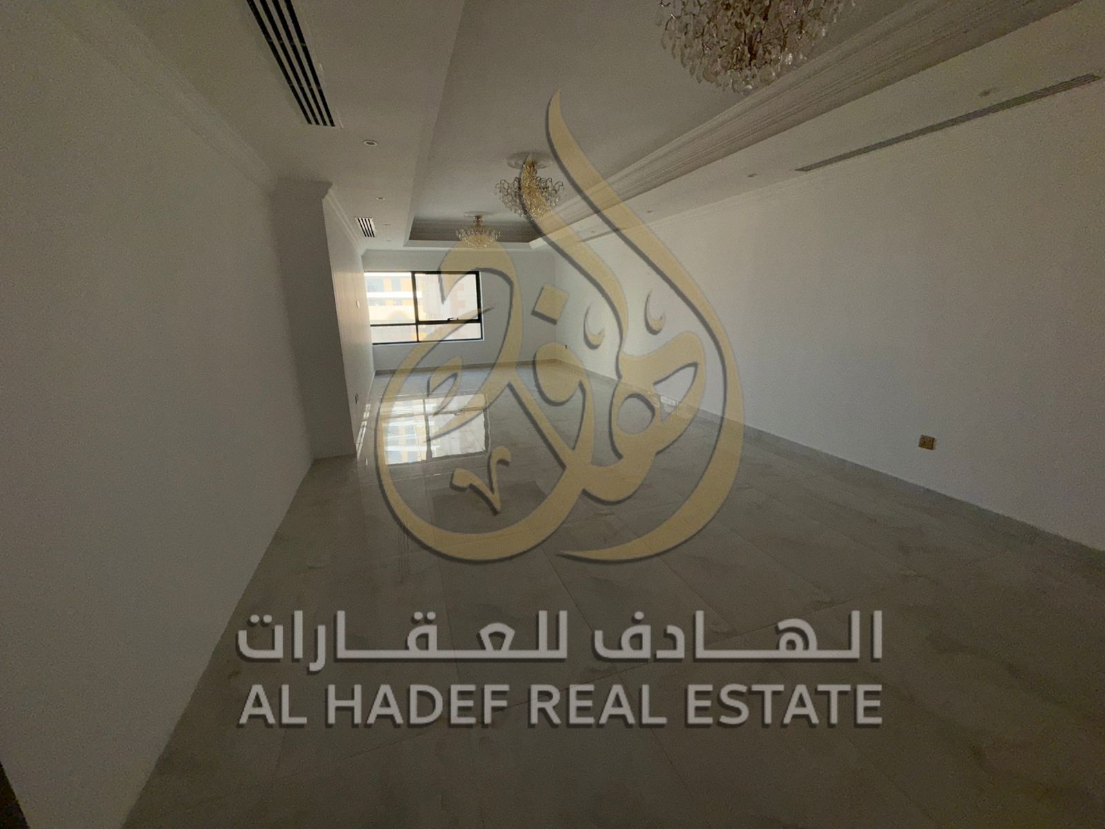 3-bedroom apartment with living room, hallway, and 3 bathrooms in Al Majaz 3 area, close to all services.