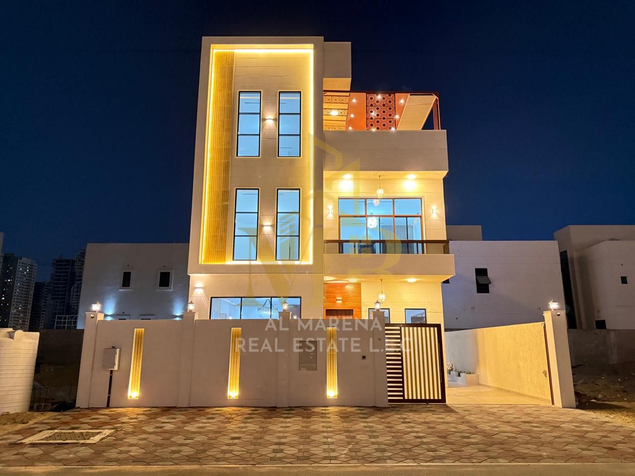 Luxury villa for sale in Al Amara - Ajman (2 floors + roof + private pool) Location: Al Amara - Ajman Land area: 3,014 sq m Built-up area