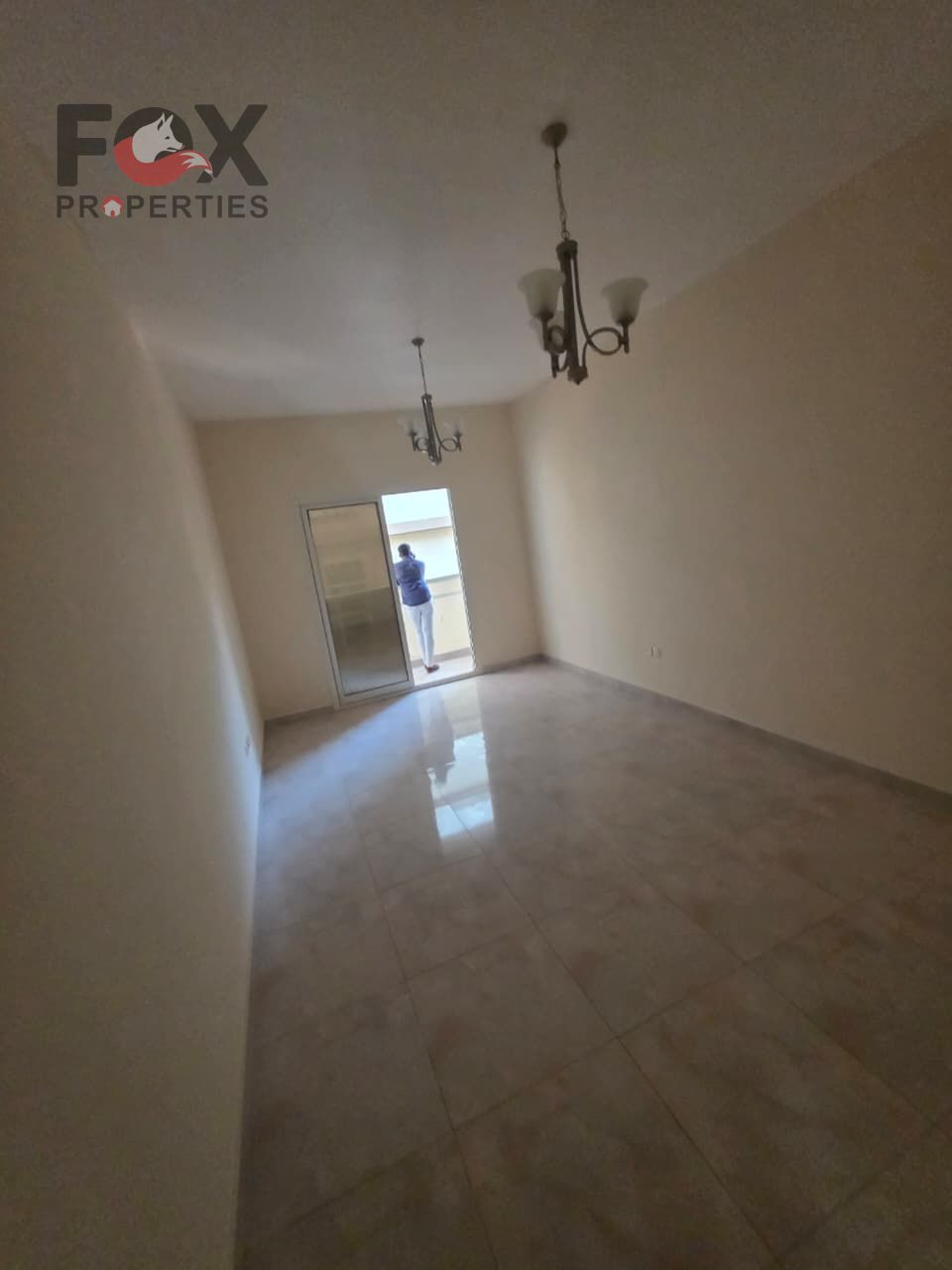 One bedroom and living room for rent near Ajman University on the main street, with a master bedroom and new finishing.