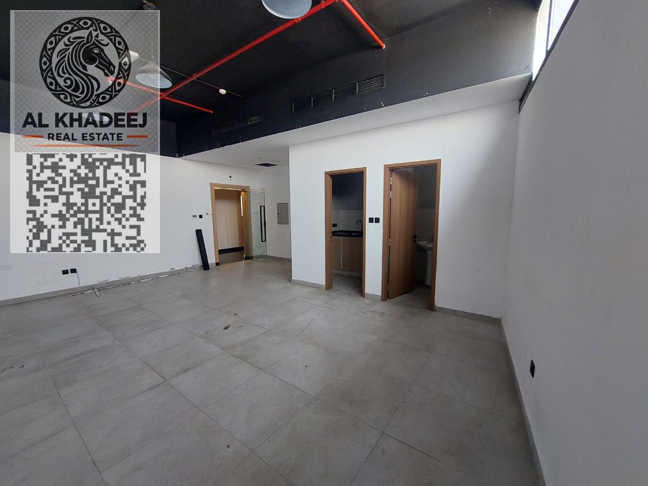 Spacious Office for Annual Rent in Al Jurf 3 – Main Road – Next to China Mall – Luxury Building – Pantry – Private Bathroom – Central AC – 430 Sq. Ft