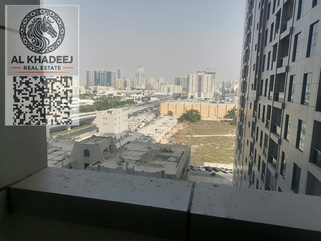 A large room and hall with a balcony and 2 bathrooms in City Towers Al Nuaimiya 3, opposite Grand Mall, easy access to Dubai and Sharjah