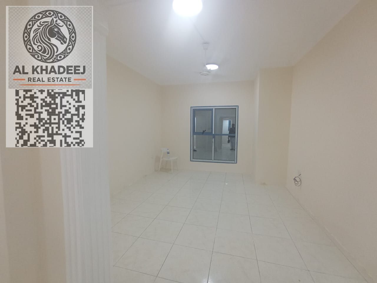 Two rooms and a hall with a balcony overlooking the city and a maid's room in Al Khor Al Rashidiya Towers 1, easy access to Dubai and Sharjah