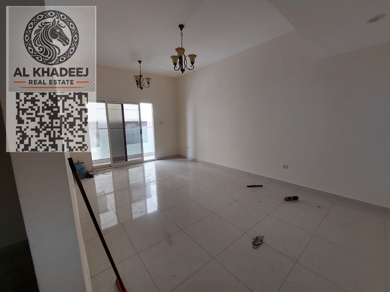 Spacious 2BR master apartment in Al Hamidiya 1, large hall, balcony, 3 baths, closed kitchen, central AC, parking, annual rent 42,000 AED.