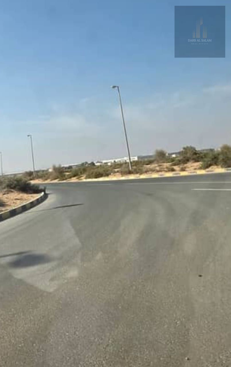 Industrial land for sale in Al Sajaa, new distribution