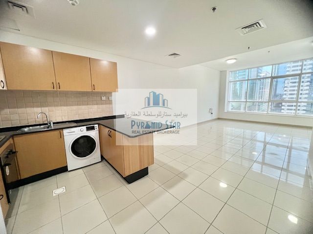 studio with kitchen appliances ready to move in