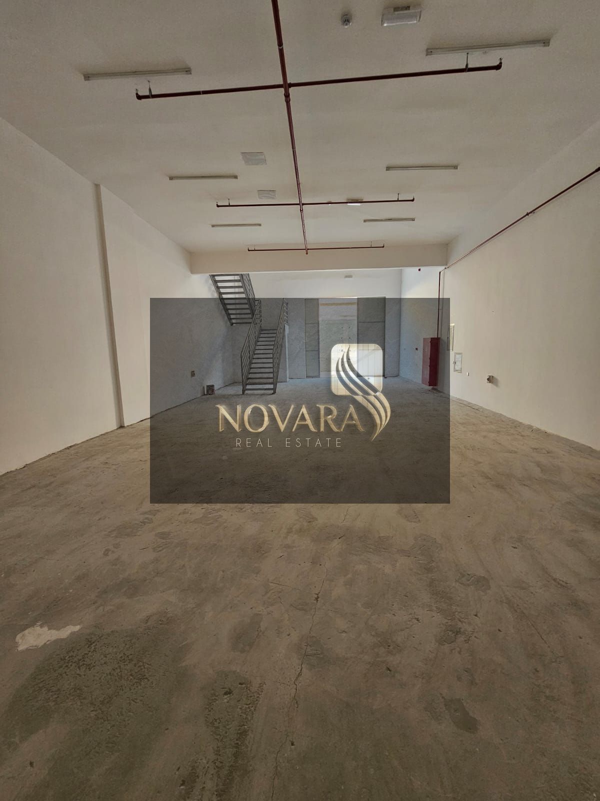 For rent in Ajman, Al Jurf Industrial Area 1: Two adjacent warehouses, 5000 sq ft each, with mezzanine and 50 kW electricity, at a special price.