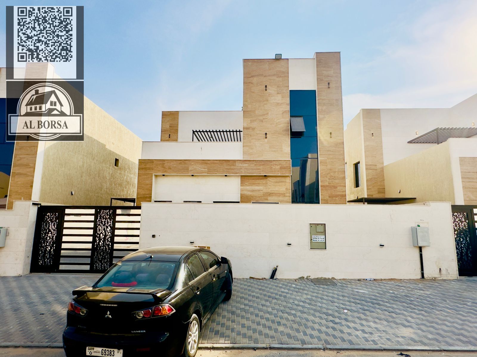 Villa for sale in Al Helio 2, Ajman. 4 bedrooms, living room, majlis, maid's room, and spacious kitchen.