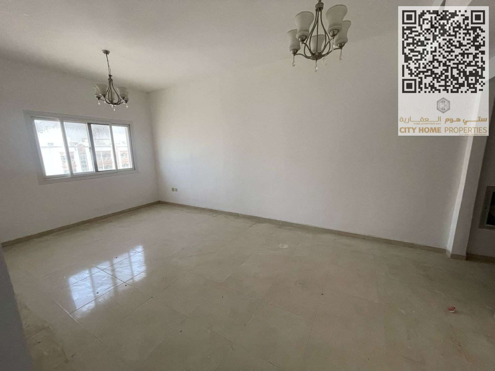 "2BHK apartment in Al Jurf 2, close to Mohammed Bin Zayed exit. " If you want a slightly longer version for an ad or listing, you can say: "Spacious
