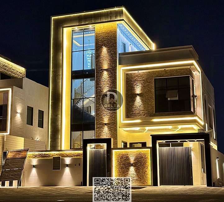 For sale: A distinctive modern villa in Al Yasmin, Ajman, 3 floors with an elegant stone facade, 5 rooms