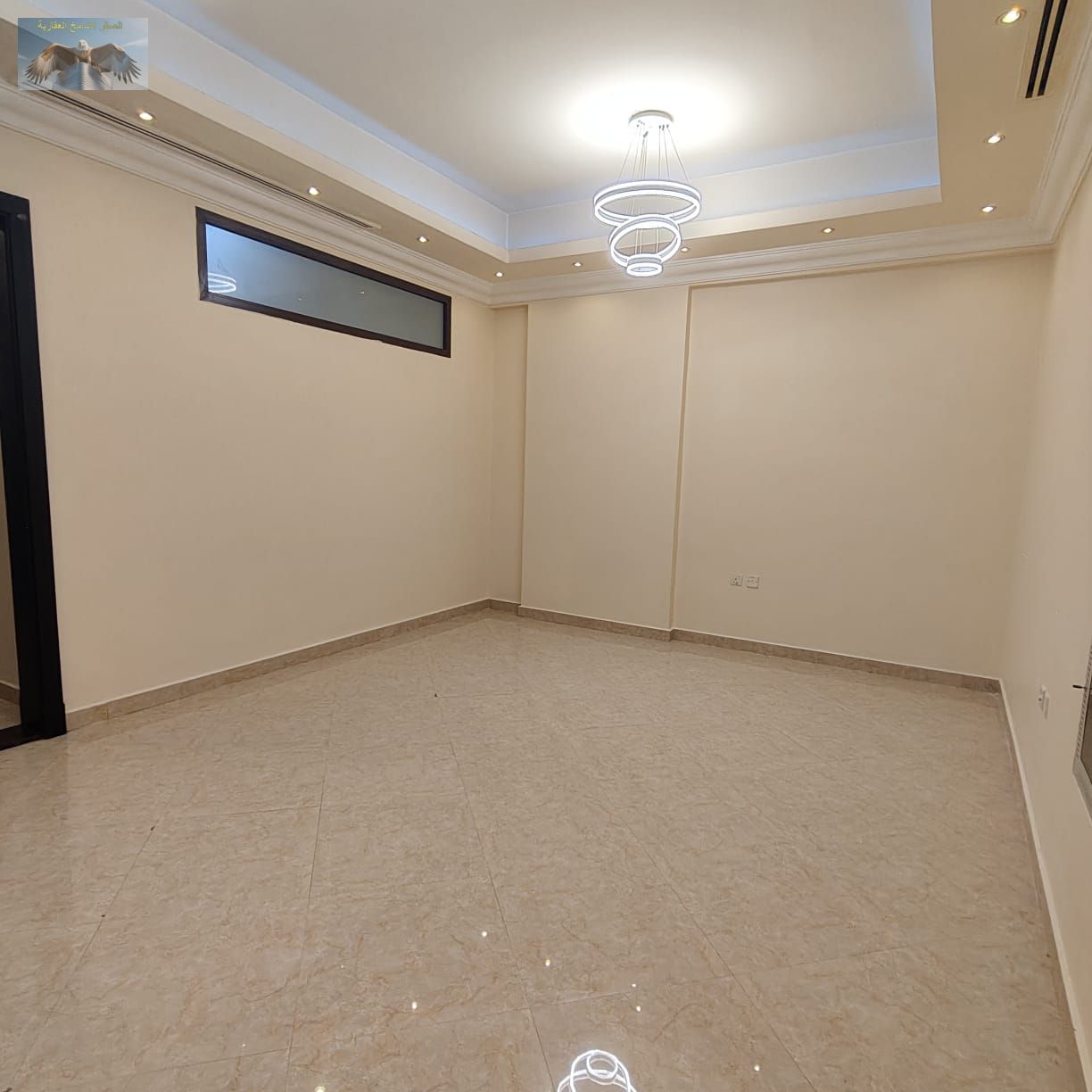 For annual rent in Ajman: a powerful and modern three-bedroom apartment with a living room and high-end finishing.