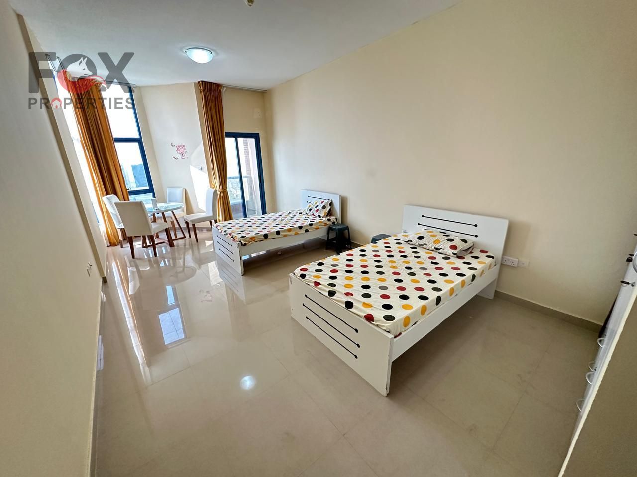In the heart of Ajman, in one of its top towers, with private parking, balcony, two master bedrooms, spacious layout, easy payment plan,