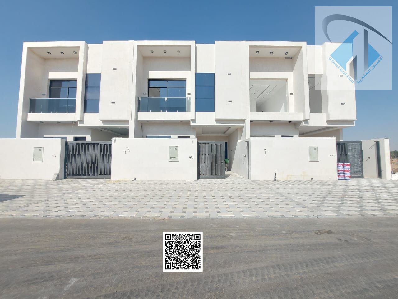 Townhouse for sale in Ajman, freehold ownership including registration fees, with monthly installments for 25 years, open to all nationalities.