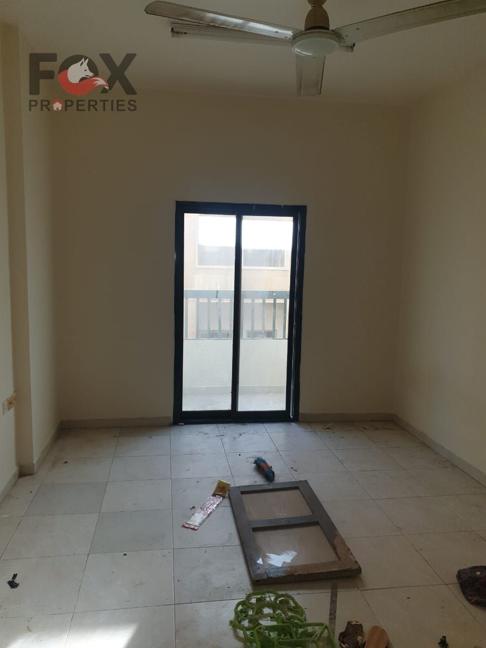 One bedroom and living room for annual rent in Al Nakheel, Ajman, with balcony, central air conditioning, and located close to services.
