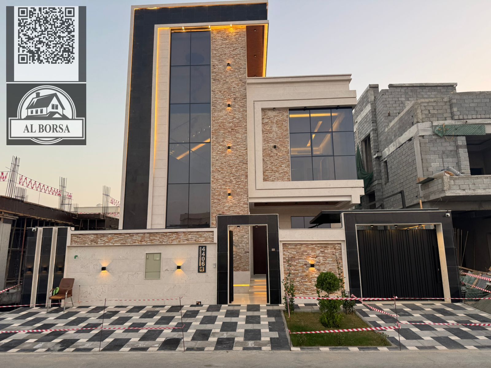 For sale in Al Yasmin, a two-story villa with a roof terrace, featuring 5 master bedrooms, a majlis, 2 living rooms, a spacious kitchen, and a maid's