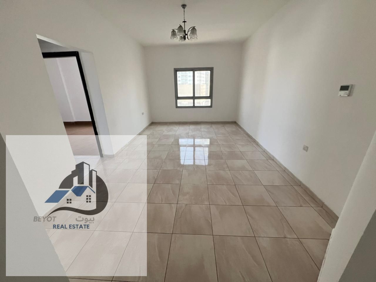 For Rent in Ajman – Al Rashidiya 1 A 2-bedroom apartment with a living room in a prime location just steps away from Al Mina Street, offering easy ac