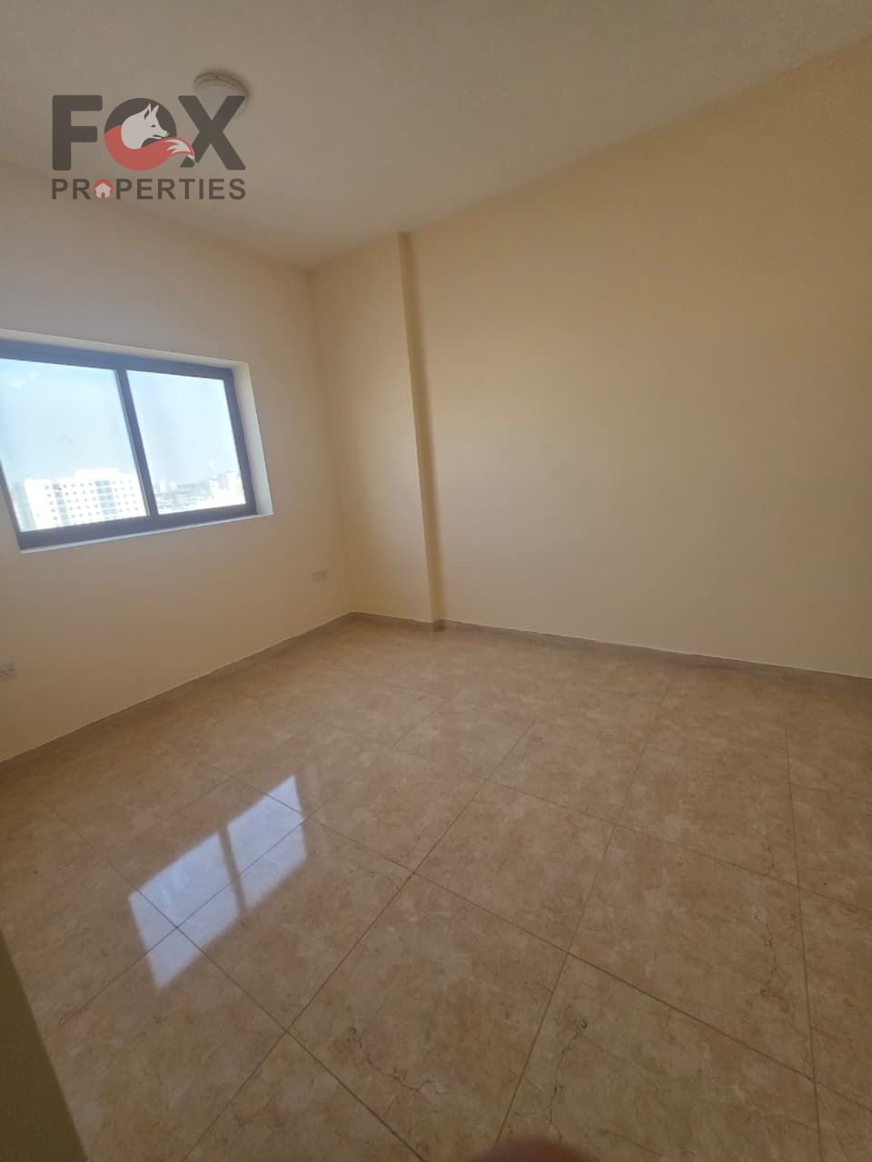 In a prime location in Al Jurf, nearby key services, offering **large spaces**, **excellent payment facilities**, and an **outstanding price