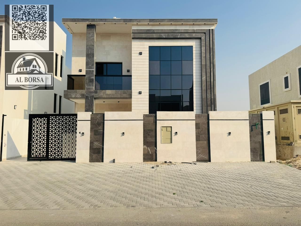 For sale in Al Amrah area, Ajman: a villa with 6 master bedrooms, a majlis, a living room, and a maid's room.