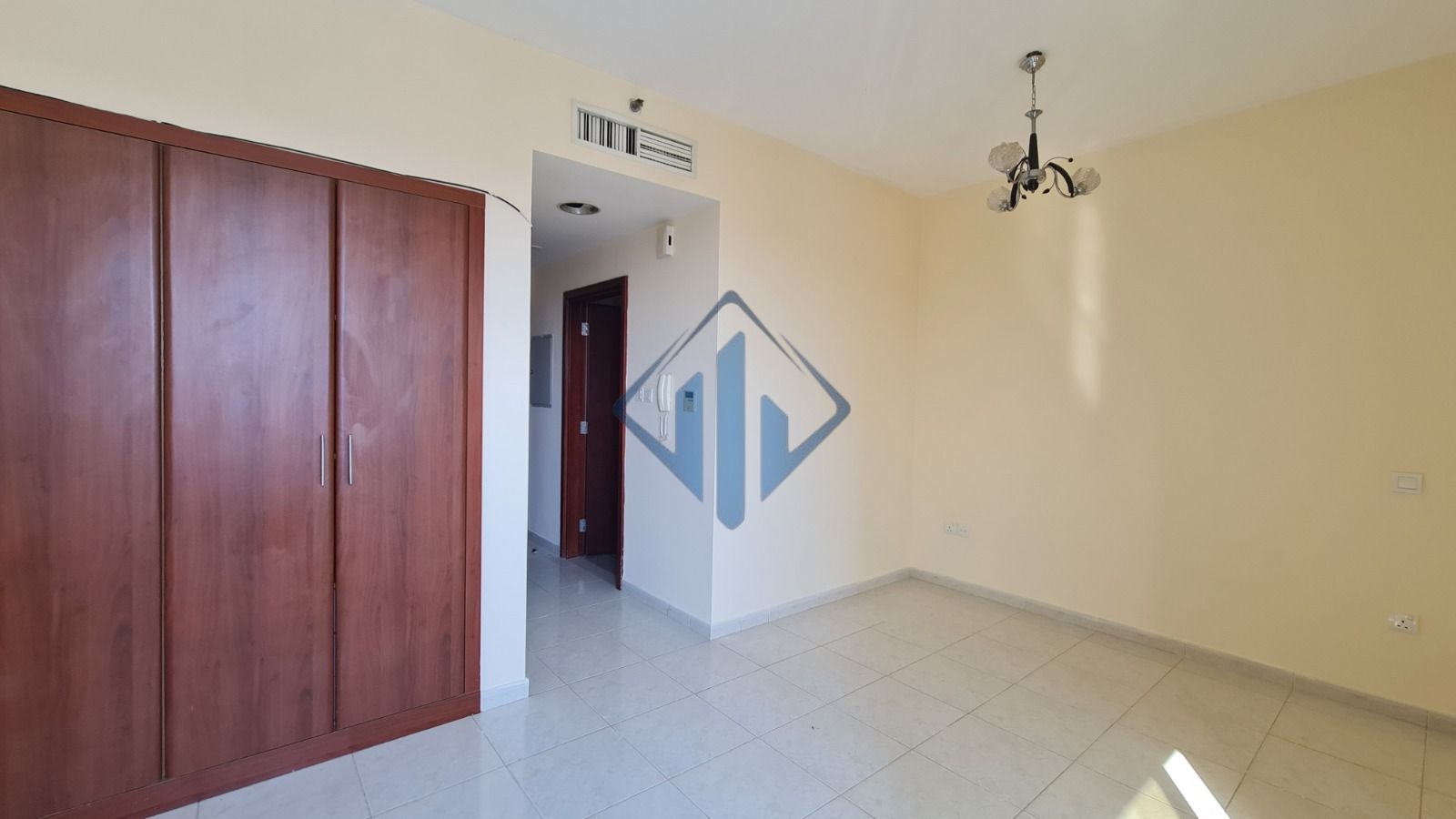 Cozy unfurnished studio prime Mina Al Arab location