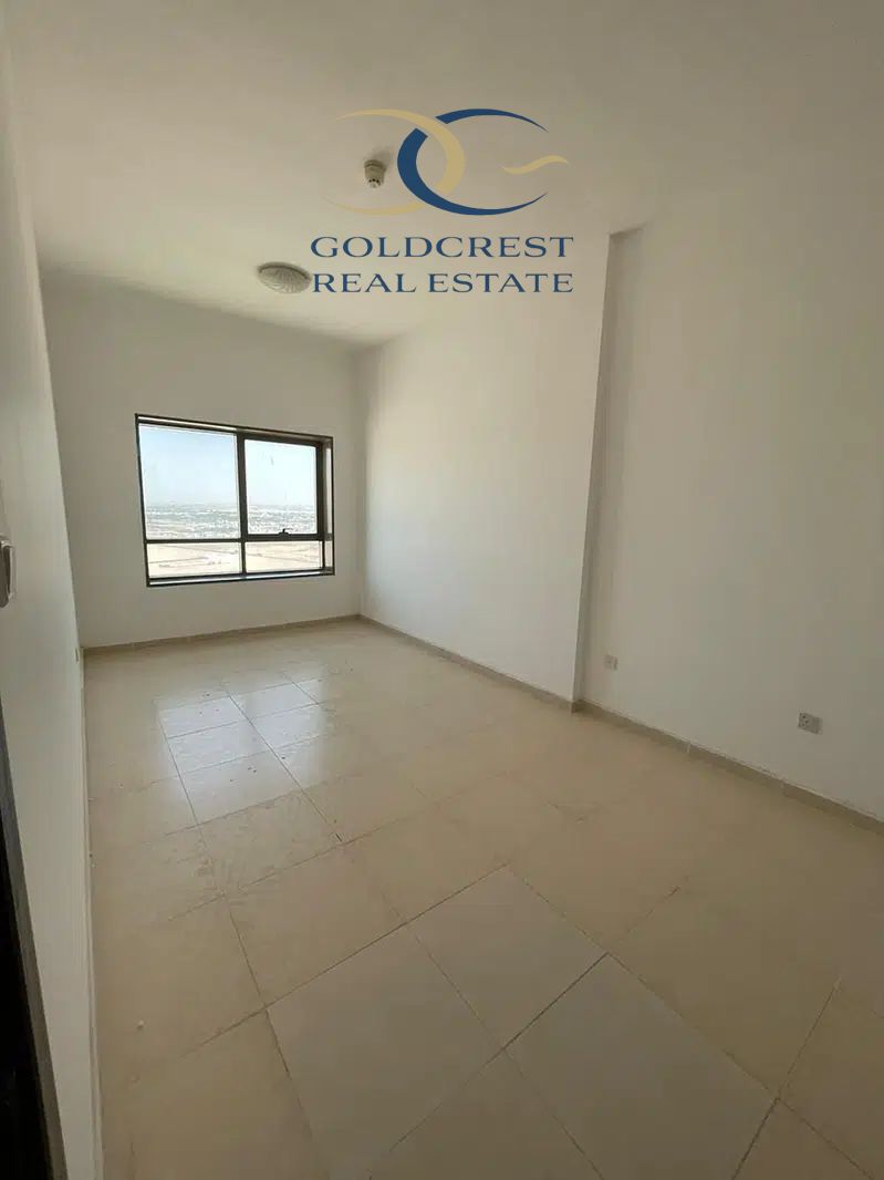 "Chic 1BHK Retreat in Lavender Tower: Open Views, Spacious Living with Closed Kitchen & Allocated Parking"
