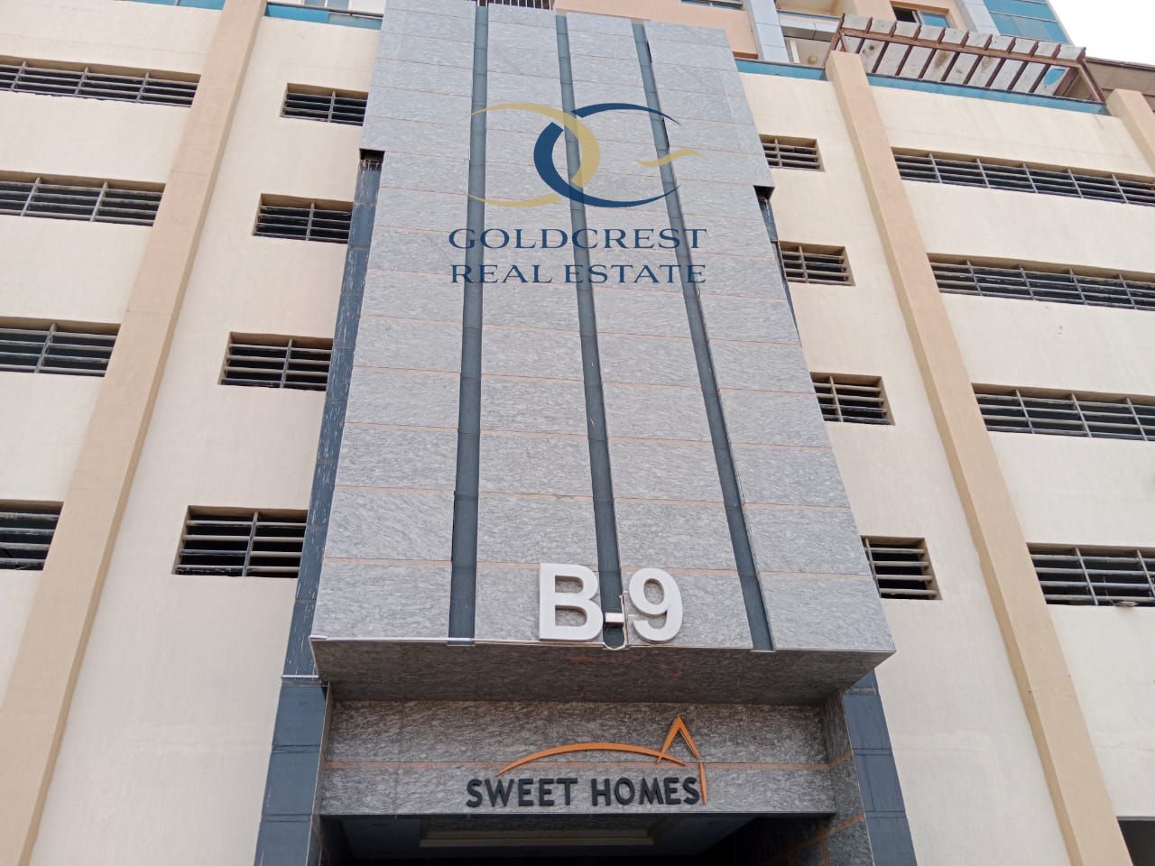 "Chic 1BHK Retreat in Lavender Tower: Open Views, Spacious Living with Closed Kitchen & Allocated Parking"