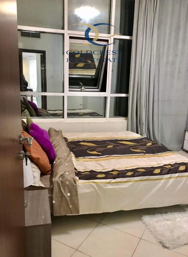 Fully Furnished 1BHK Apartment with Parking for Sale in Orient Tower, Ajman — With Flexible Payment Plan