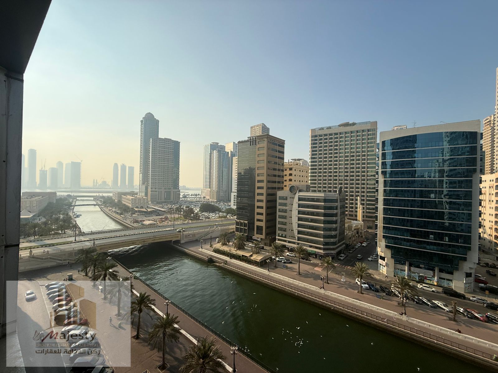 Luxury fully furnished apartment with direct Al Qasba Canal view and panoramic vistas of Khalid & Al Khan Lakes in Al Majaz 3, Sharjah, with balconies
