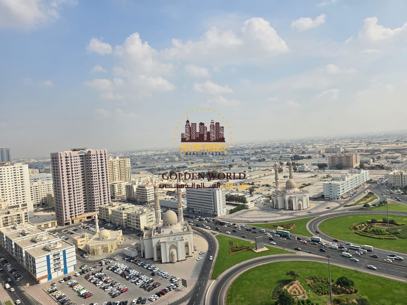 Two-bedroom panoramic apartment with large balcony and dedicated parking near Dubai exit in Al Taawun, bright and practical layout
