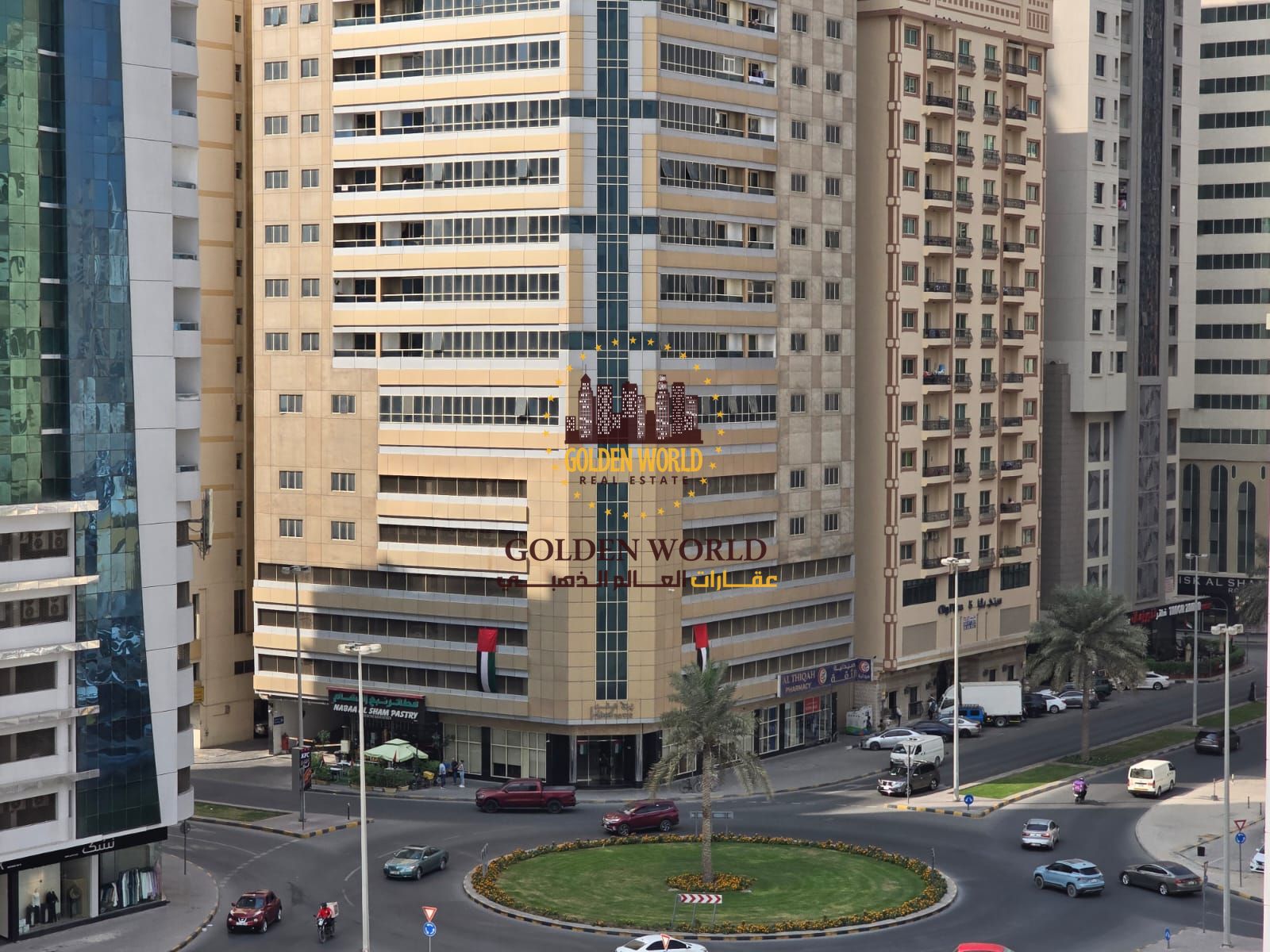 Two-bedroom panoramic apartment with balcony, terrace, and parking near Dubai exit in AlTaawun, featuring master room and practical layout