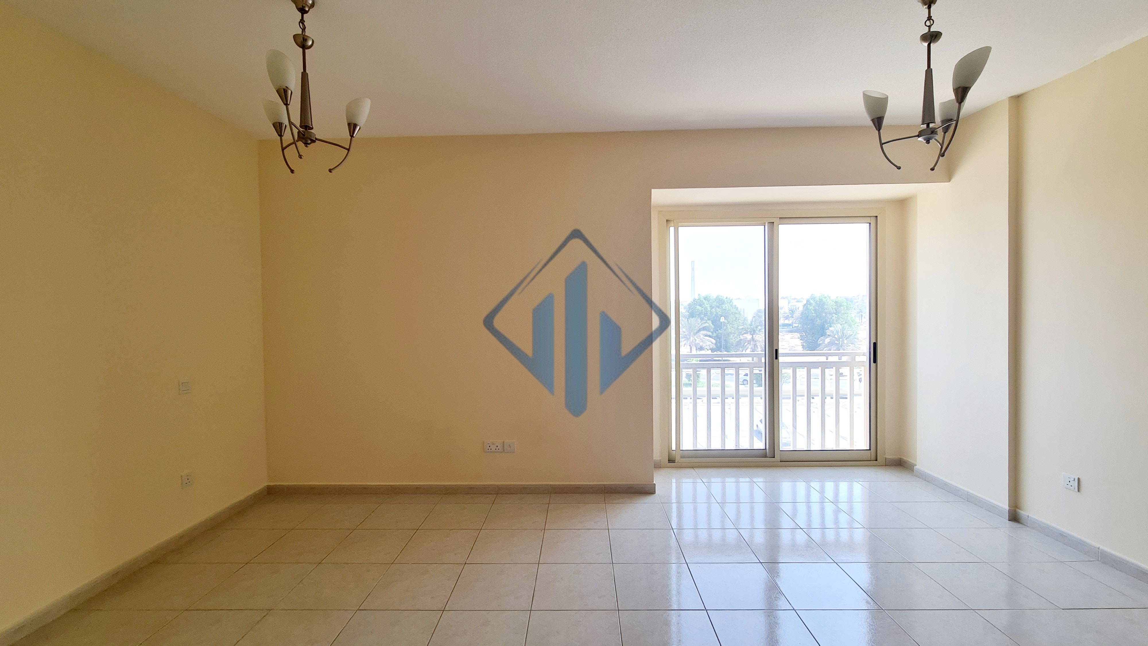 Spacious unfurnished studio in prime Mina location