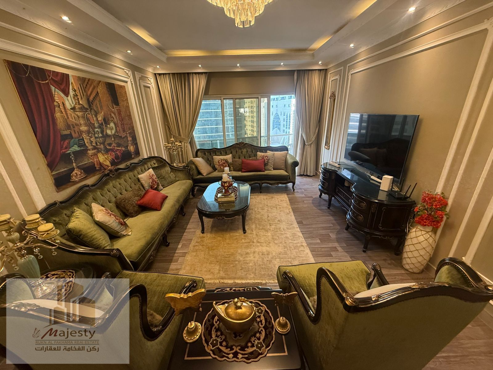 Apartment for sale in Al Majaz 3 area, overlooking Al Qasba Canal, with an open view.