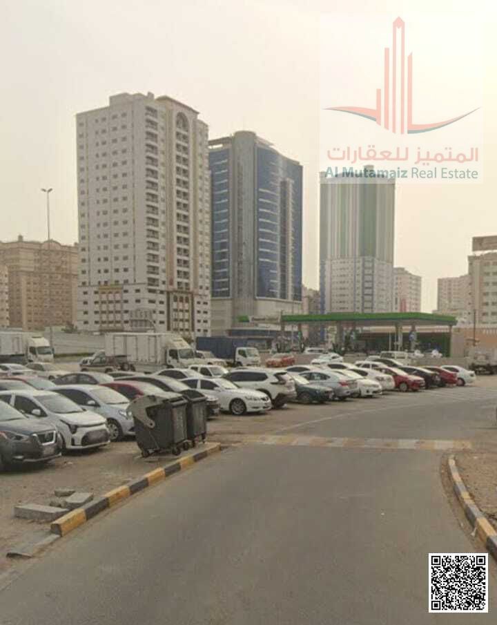 Land for sale in Ajman, Al Rashidiya 2, corner plot, 3 streets and alley, residential/commercial, ground floor + 20 sq ft, 25,000 sq ft. Asking price: