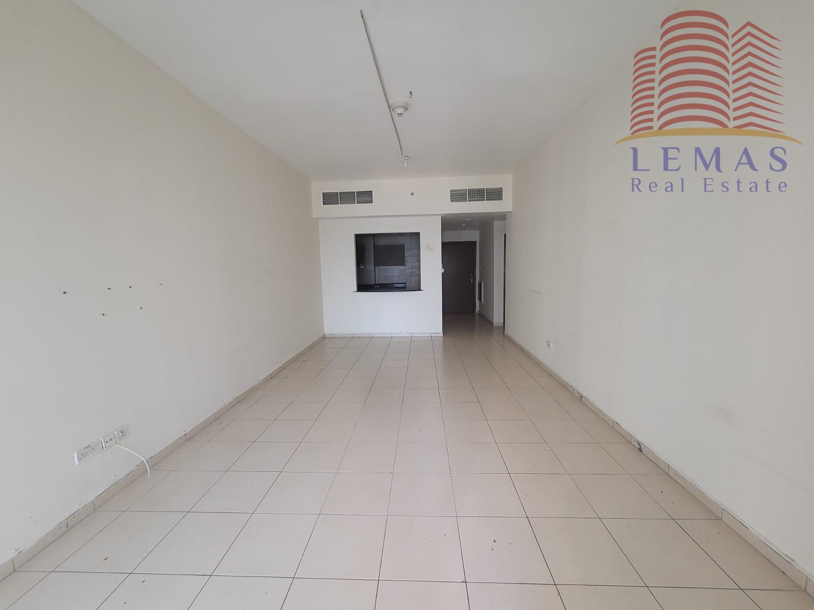 2 bedrooms and a larger living room with parking space