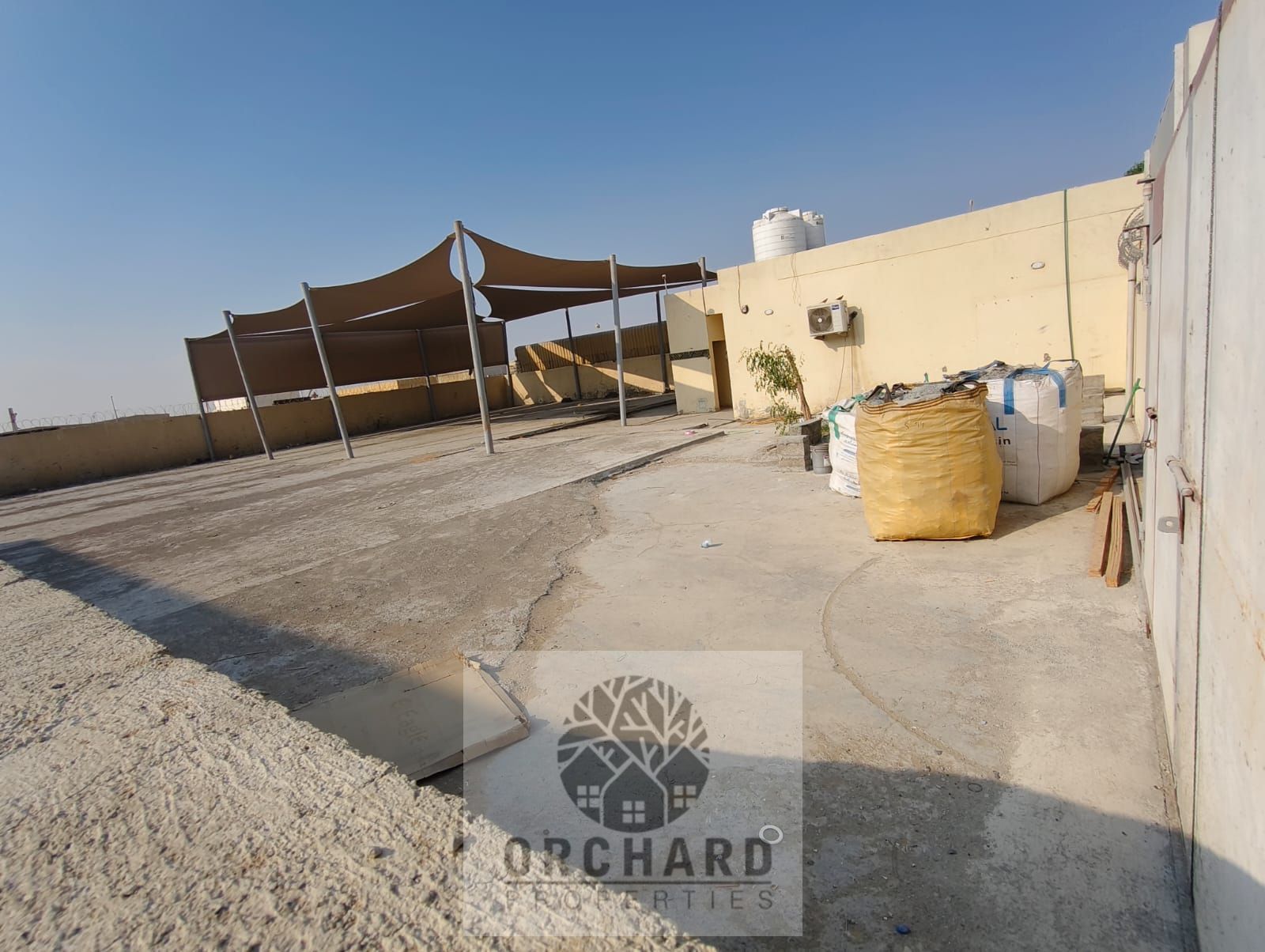10000 Sqft yard/25Kw Power/Office/Kitchen/Wahroom/Flooring with interlock/Roadfacing location/Enough loading unloading space/Rent 145,000Aed