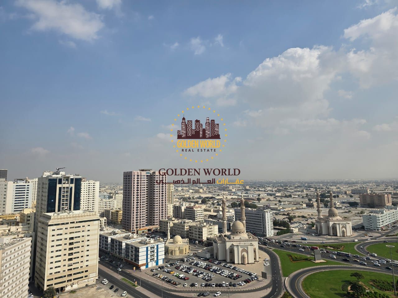 2 master bedrooms + hall in Al Taawun with Dubai exit access, balcony, parking, maid’s room, 3 baths, open views. Rent 55K in 4 cheques.