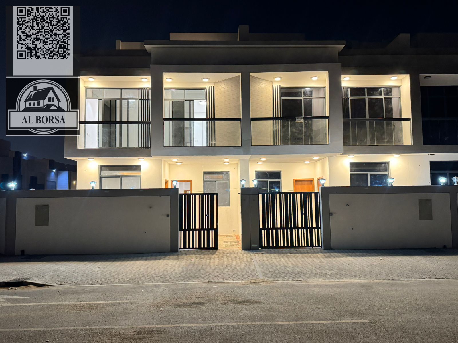 For sale in Al Bahia, a two-story townhouse with a roof terrace, featuring 6 master bedrooms, a living room, a majlis (formal sitting room), and a spa