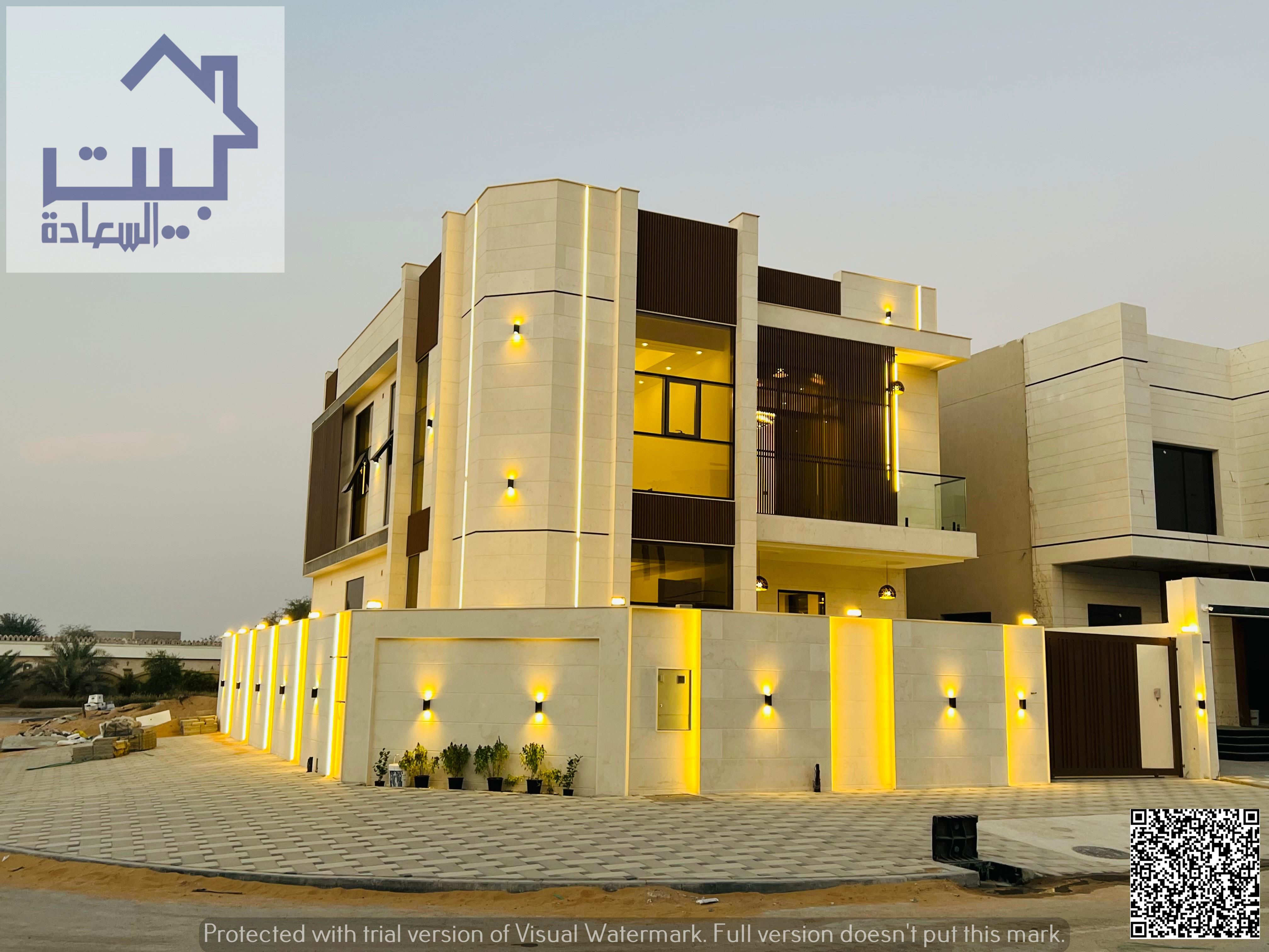 For sale: corner villa in Helio 2 Ajman, two floors + roof, strategic location near Sheikh Mohammed bin Zayed Street, freehold for all nationalities.