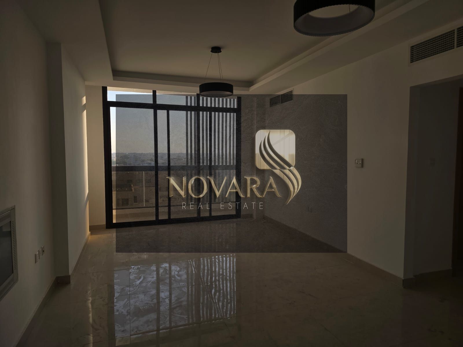 Brand-new 2BR apartment in Al Jurf 3 with modern finishes, equipped kitchen, 3 bathrooms, free month, and flexible 43K rent.