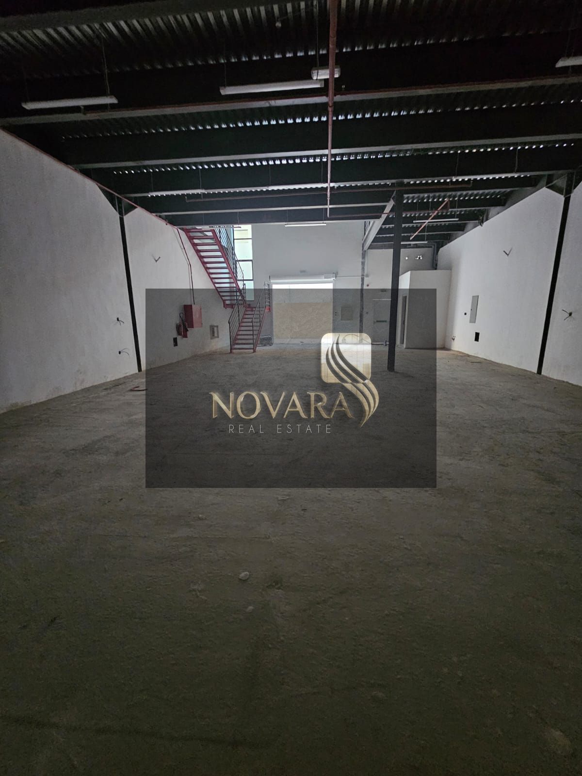 3400 sq ft warehouse with two mezzanines in Al Jurf Industrial Area 1, 36KW electricity and two internal bathrooms, for annual rent of AED 177,000.