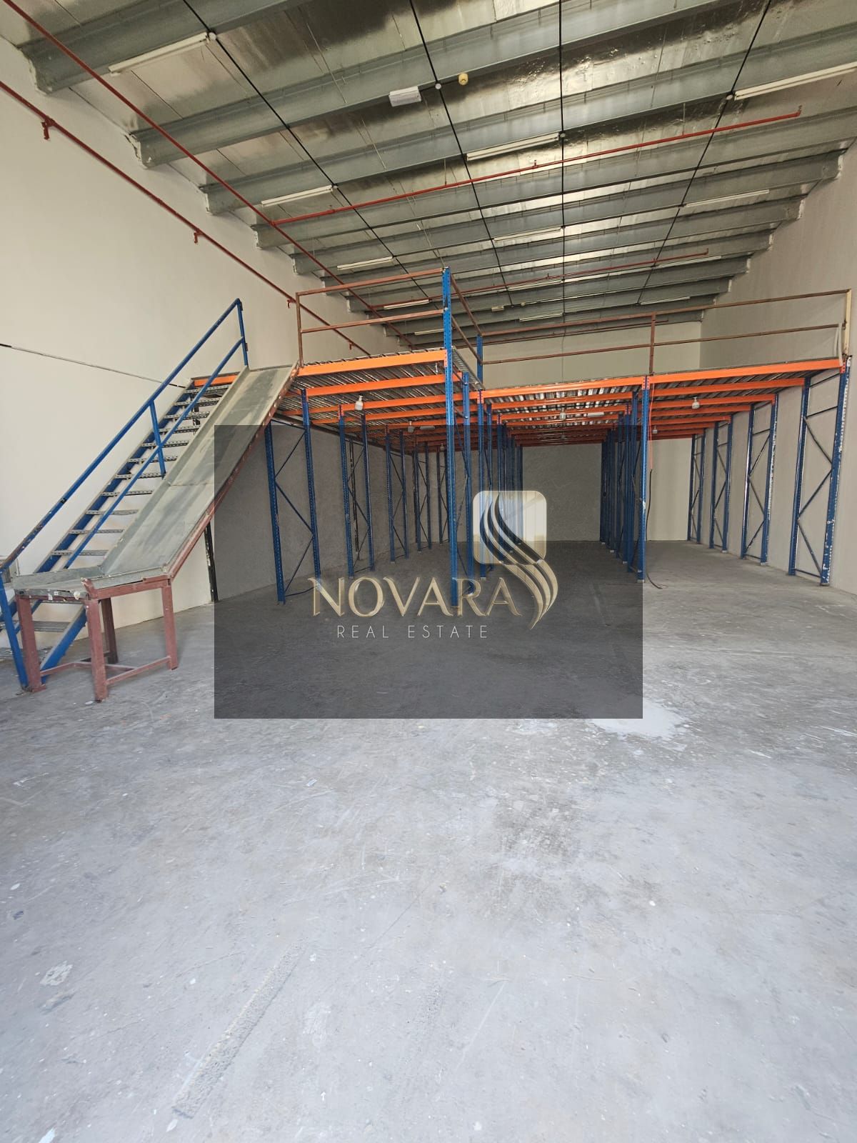 2500 sq ft warehouse with mezzanine in Al Jurf Industrial Area 1, Ajman, 3-phase 25KW electricity, annual rent 110,000 AED, ready for immediate occupa