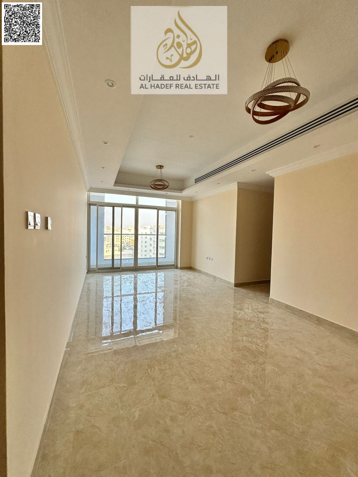 Annual rent in Ajman, Al Rawda 1 area, near Al Hamidiya police stations. Three-bedroom apartment with a living room, balcony, open view, central air c