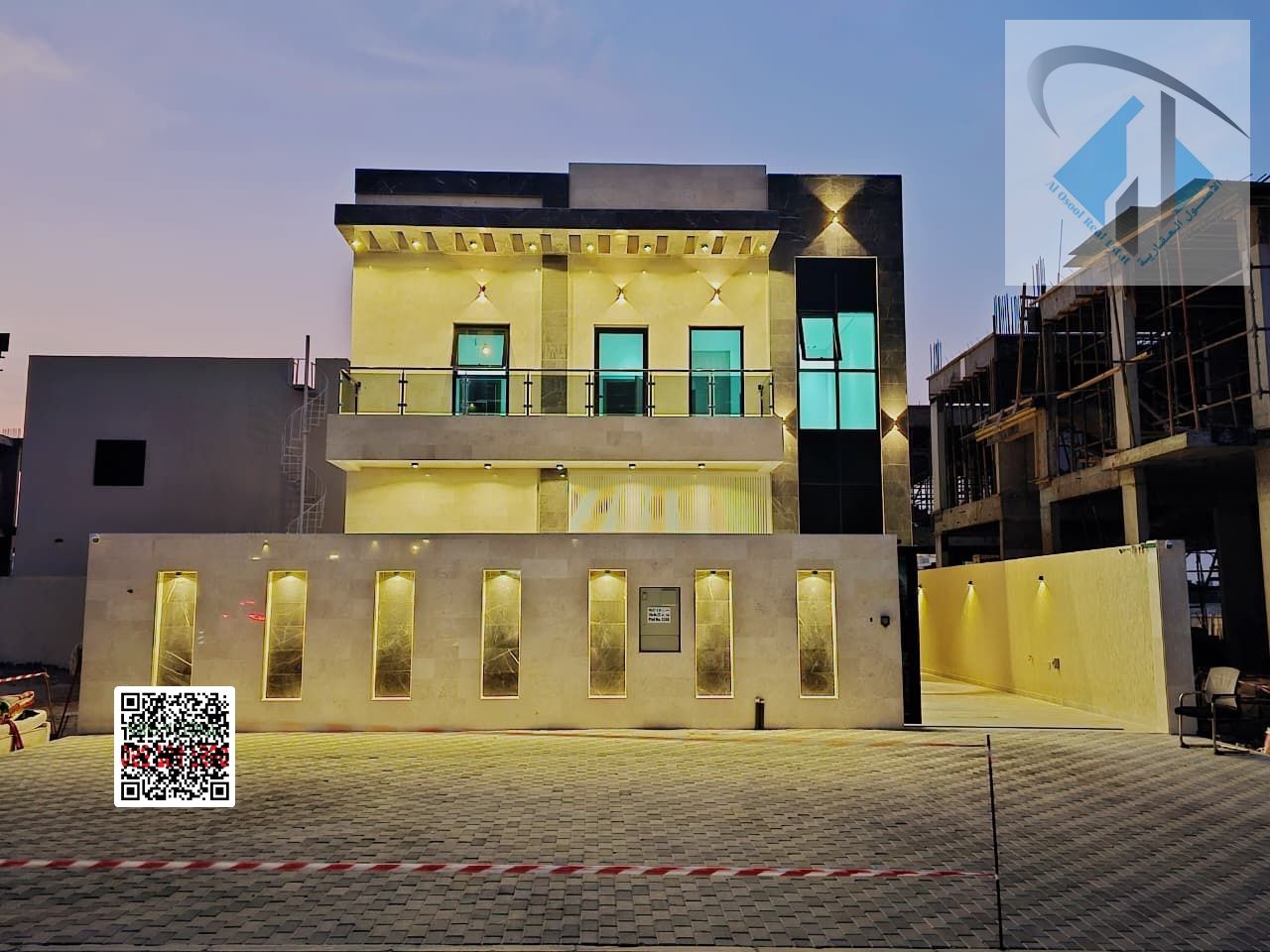 Villa for sale, including registration fees, with a yard behind Sheikh Mohammed Bin Zayed Road, with a built-up setback and an outdoor seating area. F