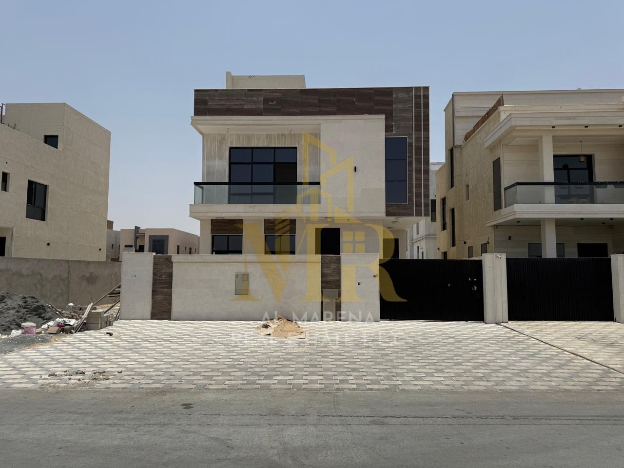 Villa for sale in Al Yasmin area with a swimming pool, freehold ownership.