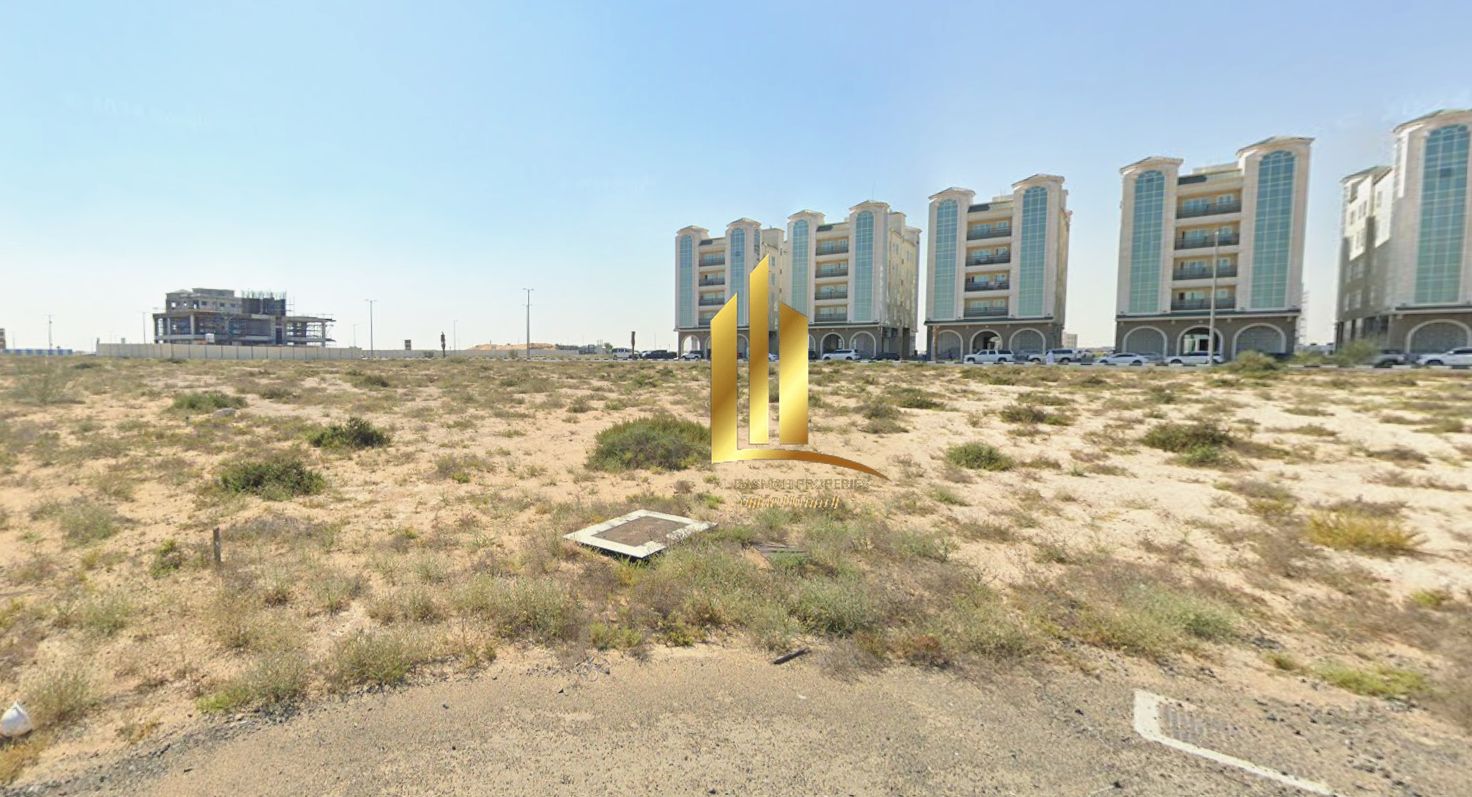 Commercial land for sale in Tilal City, Sharjah, in a prime location.