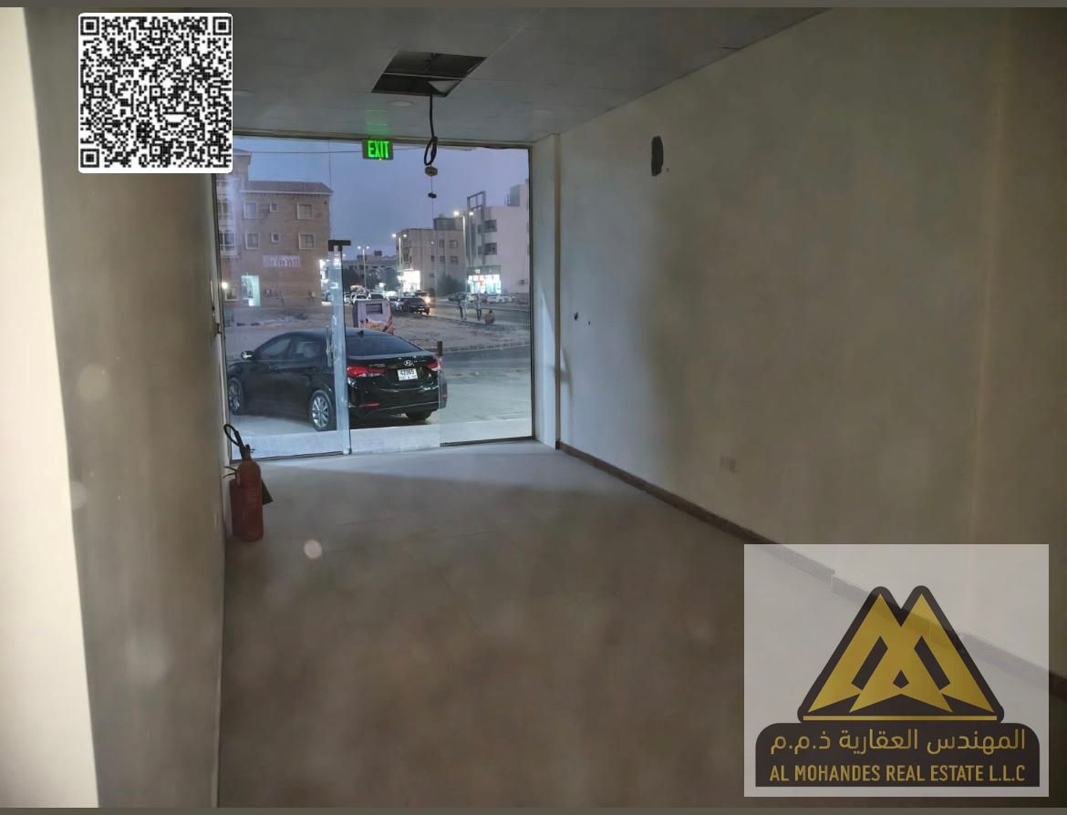 For Rent: Commercial Shop in Al Mowaihat 3 Located on a main road and positioned on a corner, providing excellent visibility and high foot traffic.
