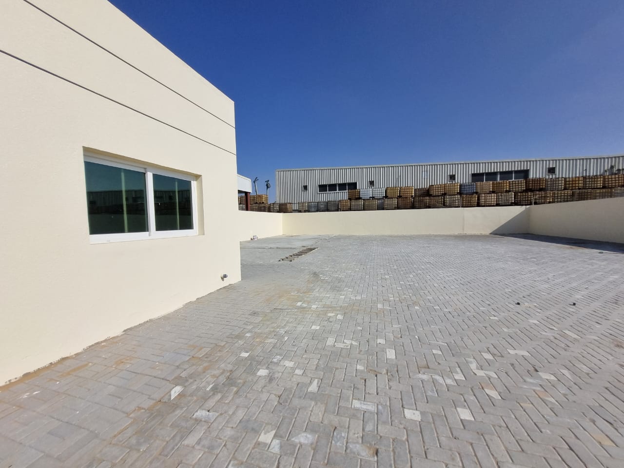 READY TO MOVE 7000 SQRFT OPENT YARD WITH OFFICE 2 ROOMS 2 WASHROOM BOUNDRY WITH ELECTRICITY WATER AND CIVIL DIFENCE INTERLOCK NEAT CLEAN ON MAIN ROAD