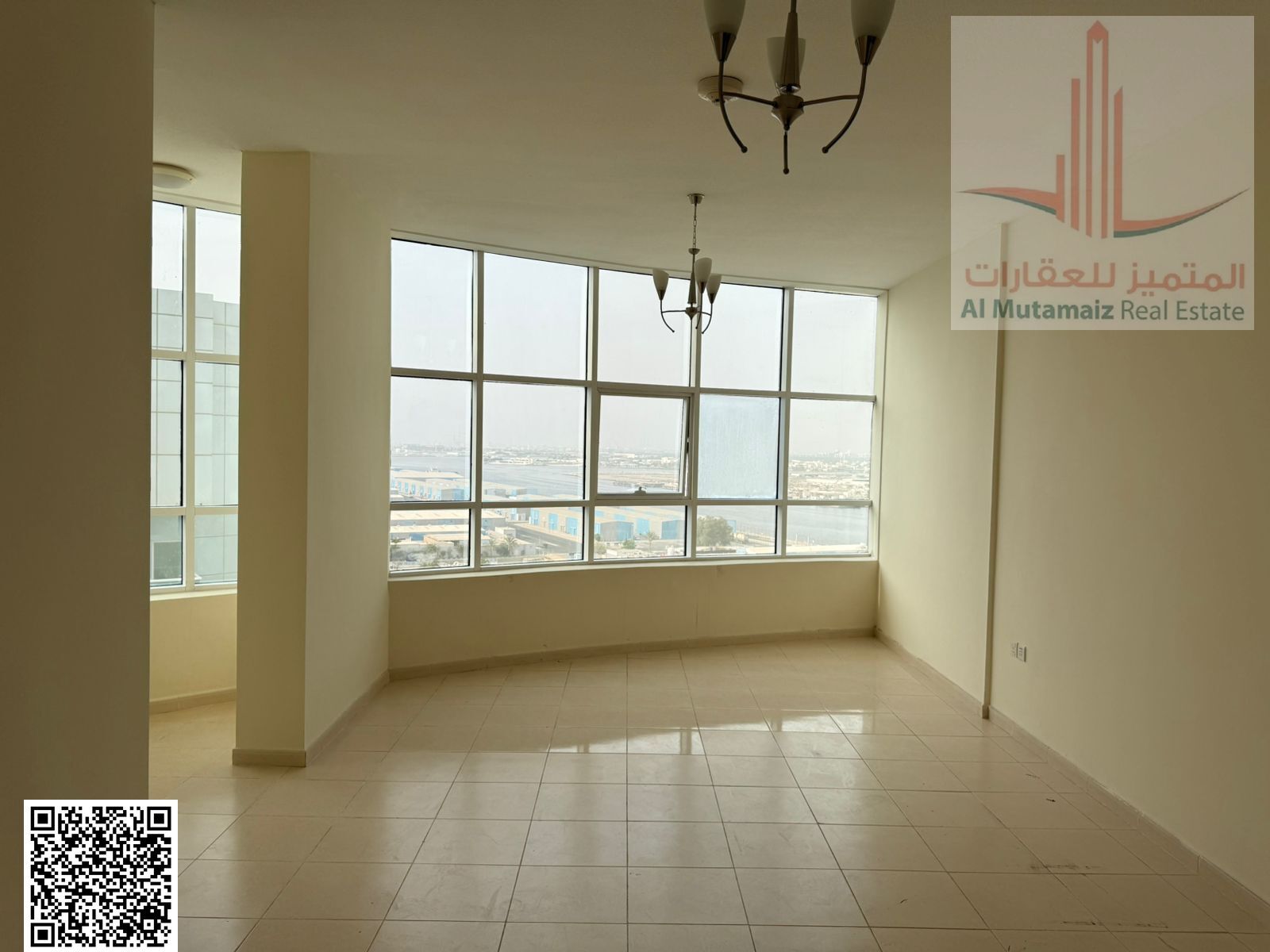 For sale in Ajman: a one-bedroom apartment with a living room and panoramic view in the Orient Towers. Asking price: 379,000 AED as a down payment.